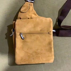 Traveling organizer crossbody bag suede